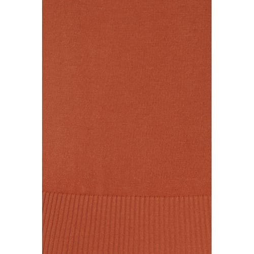 Chrissie Plain Jumper er fabelagtig 50'er-inspireret strikbluse lavet i blødt orange garn