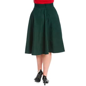 Charmerende og super klassisk retro-inspireret 50’er nederdel med vidde i flot mørkegrønt fløjs lignende stof