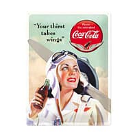 Coca cola tinskilt og teksten Your thirst takes wings