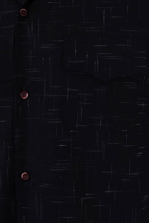 Adam Crosshatch er en autentisk skjorte i 1950'er stil, der får dig til at se skarp ud. Den er i et flot abstrakt 1950'er crosshatch mønster